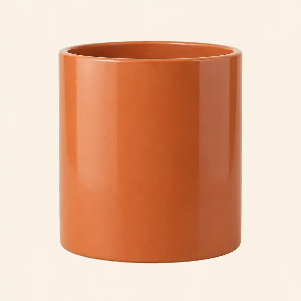 Ceramiczna donica w kolorze terakoty o prostym cylindrycznym kształcie